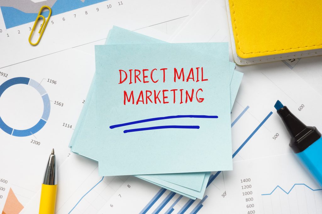 'DIRECT MAIL MARKETING' inscription on paper.
